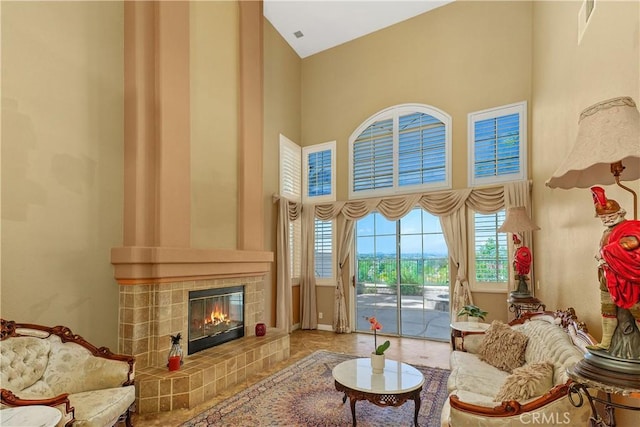 44886 Camino Veste, Temecula, CA 92592 - living room with a high ceiling and a tiled fireplace