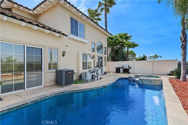 44886 Camino Veste, Temecula, CA 92592 - view of pool with central air condition unit, a patio area, a pool with connected hot tub, and area for grilling