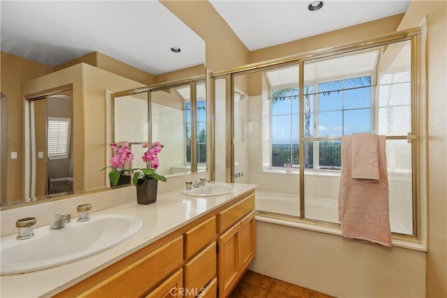 44886 Camino Veste, Temecula, CA 92592 - full bathroom featuring plenty of natural light, double vanity, a shower with door, and tile patterned floors