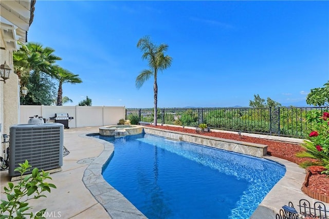 44886 Camino Veste, Temecula, CA 92592 - view of pool featuring a fenced backyard, central AC unit, area for grilling, and a pool with connected hot tub