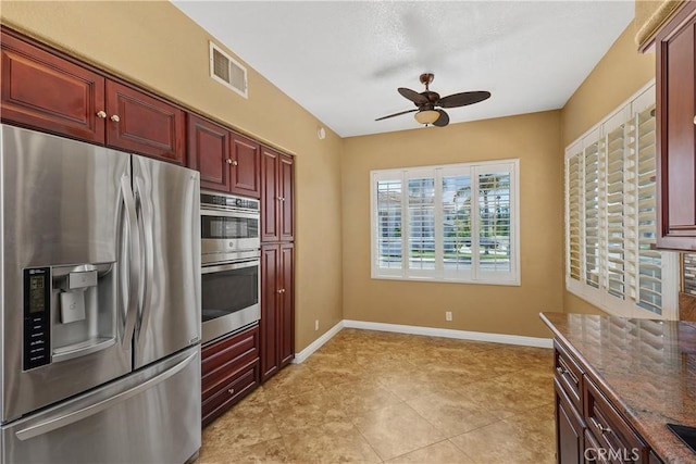 44886 Camino Veste, Temecula, CA 92592 - kitchen featuring stainless steel appliances, dark brown cabinets, ceiling fan, and baseboards