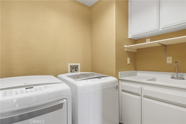 44886 Camino Veste, Temecula, CA 92592 - laundry room featuring cabinet space, washer and dryer, and a textured wall