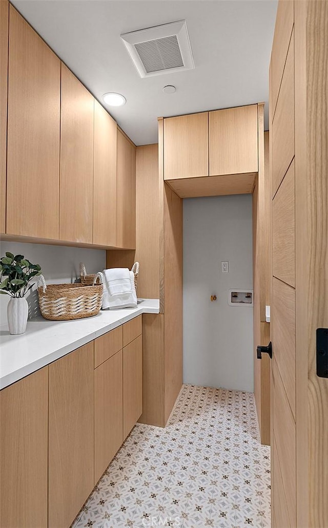 820 Calle Mendoza, San Clemente, CA 92672 - washroom with cabinet space, washer hookup, and light flooring