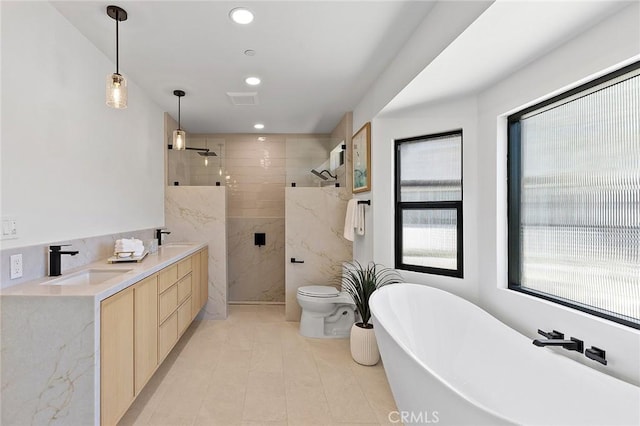 820 Calle Mendoza, San Clemente, CA 92672 - bathroom with walk in shower, a freestanding bath, tile patterned flooring, recessed lighting, and toilet