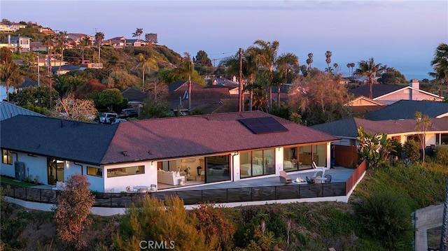 820 Calle Mendoza, San Clemente, CA 92672 - rear view of property with solar panels, a patio, and a fenced backyard