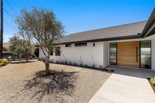 820 Calle Mendoza, San Clemente, CA 92672 - property entrance featuring stucco siding, fence, and a shingled roof