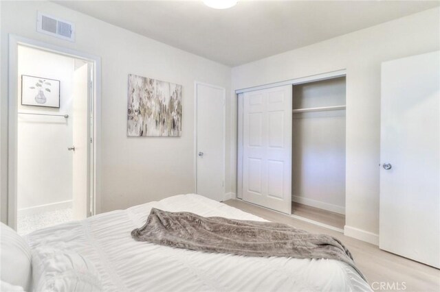 16928 Pocono St, La Puente, CA 91744 - bedroom featuring wood finished floors, a closet, and baseboards
