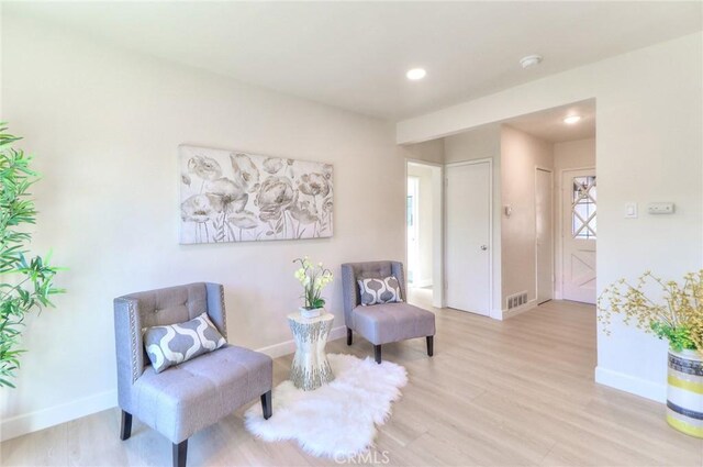 16928 Pocono St, La Puente, CA 91744 - sitting room featuring baseboards, light wood finished floors, and recessed lighting