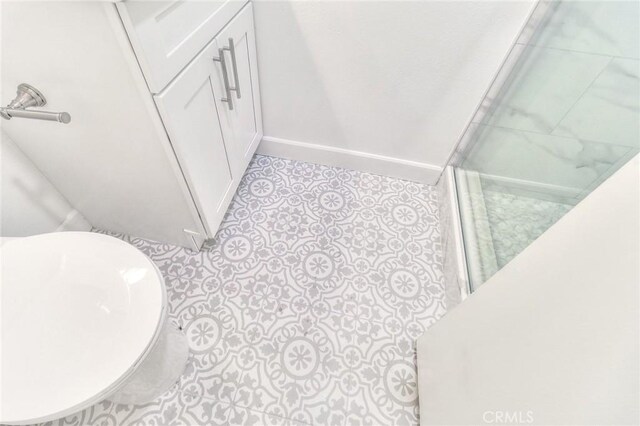 16928 Pocono St, La Puente, CA 91744 - full bath with baseboards, a stall shower, and tile patterned flooring