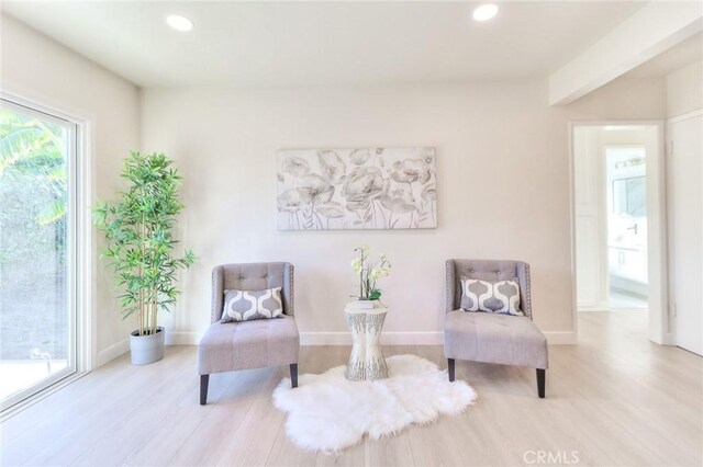 16928 Pocono St, La Puente, CA 91744 - living area featuring wood finished floors, recessed lighting, and baseboards