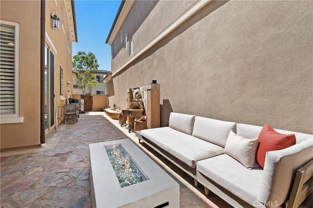 182 Rhapsody, Irvine, CA 92620 - view of patio featuring an outdoor living space with a fire pit