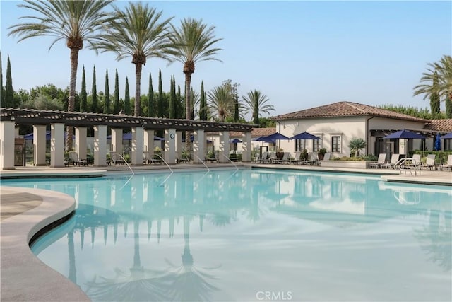 community pool featuring a patio
