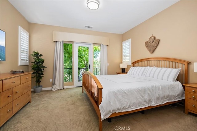 182 Rhapsody, Irvine, CA 92620 - bedroom with access to outside and light colored carpet