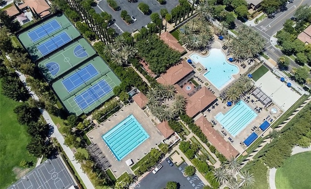 view of property location with a pool area