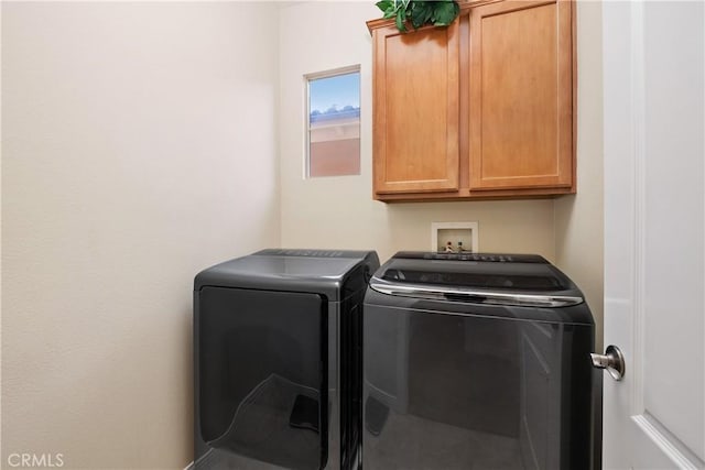 182 Rhapsody, Irvine, CA 92620 - laundry area featuring washing machine and dryer and cabinet space
