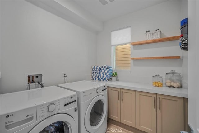 2047 Doheny Way, Dana Point, CA 92629 - laundry room featuring independent washer and dryer, cabinet space, and light wood-type flooring