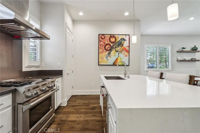 132 Interval, Irvine, CA 92618 - kitchen featuring high end stainless steel range, extractor fan, dark wood-style flooring, a sink, and recessed lighting