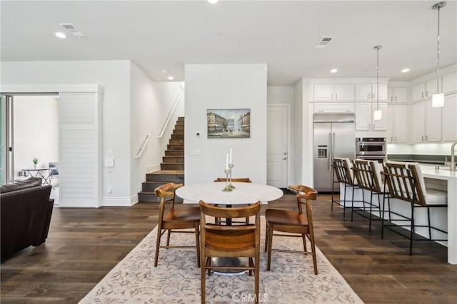 132 Interval, Irvine, CA 92618 - dining space featuring stairs, dark wood-type flooring, and recessed lighting