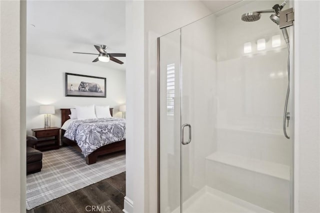 132 Interval, Irvine, CA 92618 - bedroom with dark wood-style floors and ceiling fan