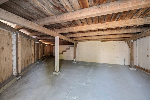 unfinished basement with stairway