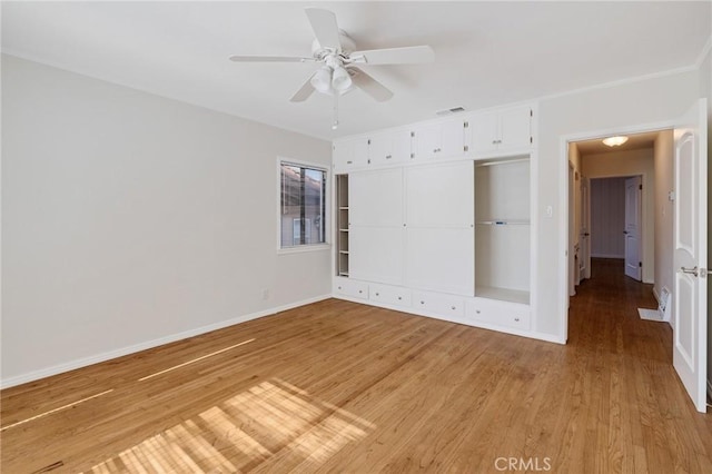 unfurnished bedroom featuring baseboards, light wood-style flooring, a closet, and ceiling fan