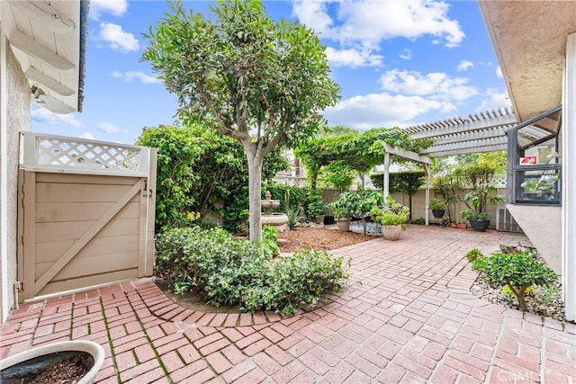 15 Firestone Unit 4, Irvine, CA 92614 - view of patio with fence, a gate, and a pergola