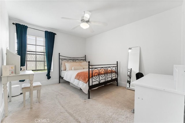 15 Firestone Unit 4, Irvine, CA 92614 - bedroom featuring light carpet, baseboards, and ceiling fan