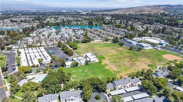 15 Firestone Unit 4, Irvine, CA 92614 - aerial overview of property's location with a water and mountain view and nearby suburban area