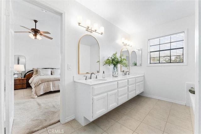 15 Firestone Unit 4, Irvine, CA 92614 - bathroom with ensuite bath, a ceiling fan, double vanity, tile patterned floors, and baseboards