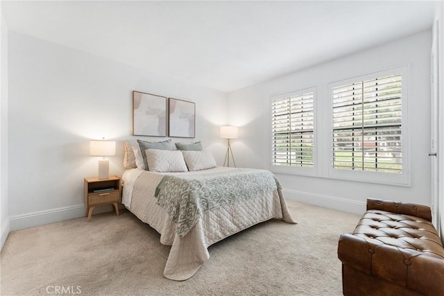 15 Firestone Unit 4, Irvine, CA 92614 - bedroom featuring baseboards and light carpet