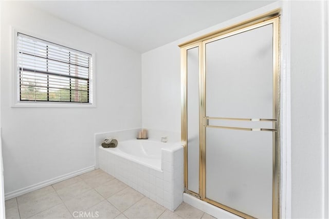 15 Firestone Unit 4, Irvine, CA 92614 - full bath featuring a shower stall, a bath, tile patterned flooring, and baseboards