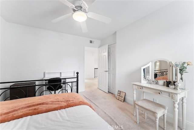 15 Firestone Unit 4, Irvine, CA 92614 - bedroom with carpet flooring, baseboards, and a ceiling fan