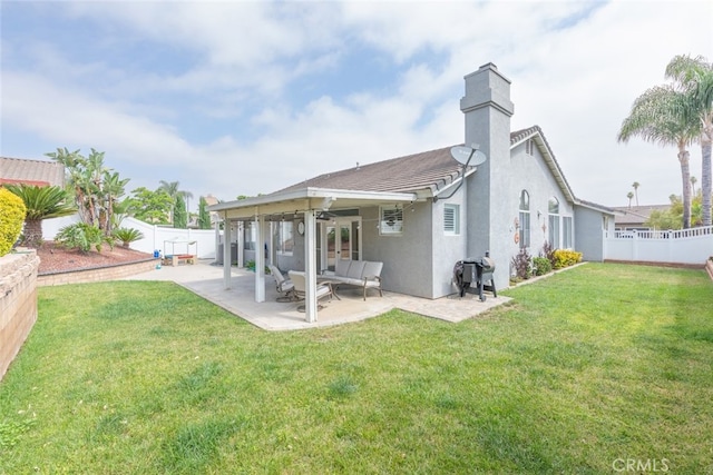 1044 Shadow Crest Cir, Corona, CA 92881 - rear view of property with stucco siding, a chimney, a patio area, and ceiling fan