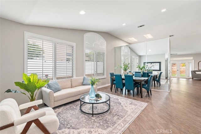 1044 Shadow Crest Cir, Corona, CA 92881 - living room with vaulted ceiling, baseboards, wood finished floors, recessed lighting, and french doors