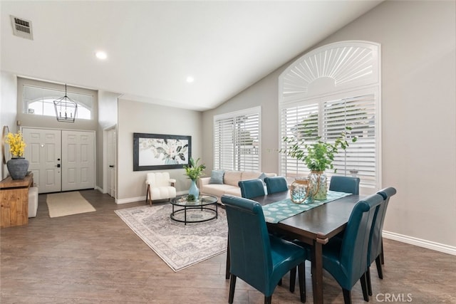 1044 Shadow Crest Cir, Corona, CA 92881 - dining space featuring baseboards, vaulted ceiling, wood finished floors, recessed lighting, and a chandelier