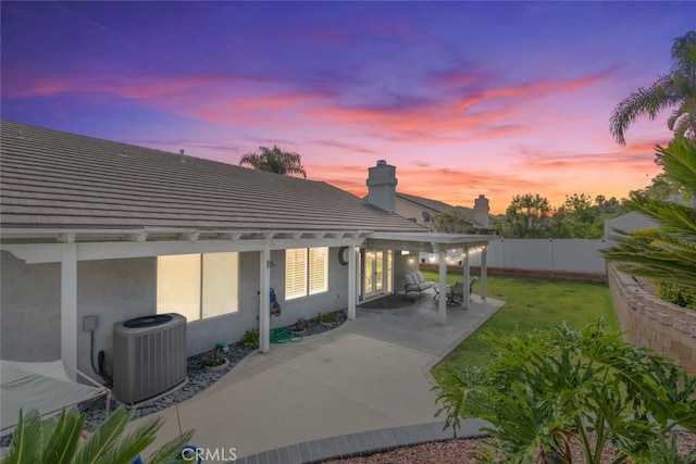 1044 Shadow Crest Cir, Corona, CA 92881 - back of house featuring cooling unit, stucco siding, a patio area, and a tile roof