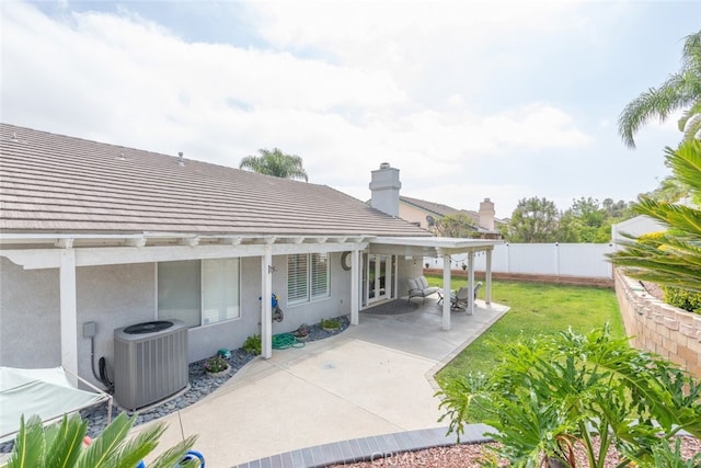1044 Shadow Crest Cir, Corona, CA 92881 - rear view of house with central AC, stucco siding, a patio area, and a tiled roof