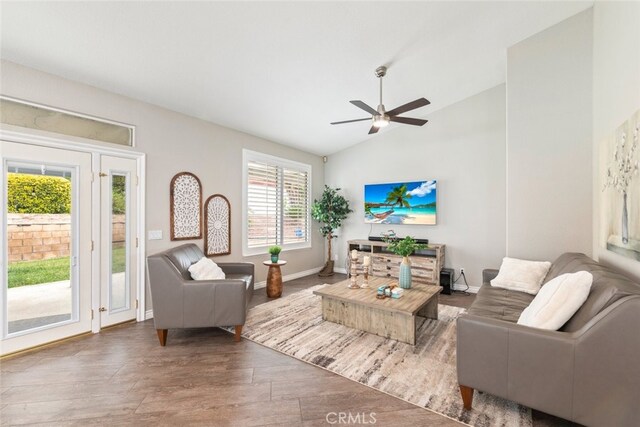 1044 Shadow Crest Cir, Corona, CA 92881 - living area featuring vaulted ceiling, ceiling fan, wood finished floors, and baseboards