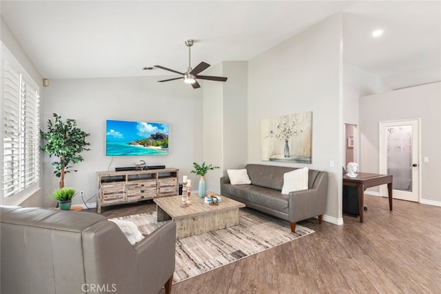 1044 Shadow Crest Cir, Corona, CA 92881 - living room with ceiling fan, wood finished floors, baseboards, and high vaulted ceiling