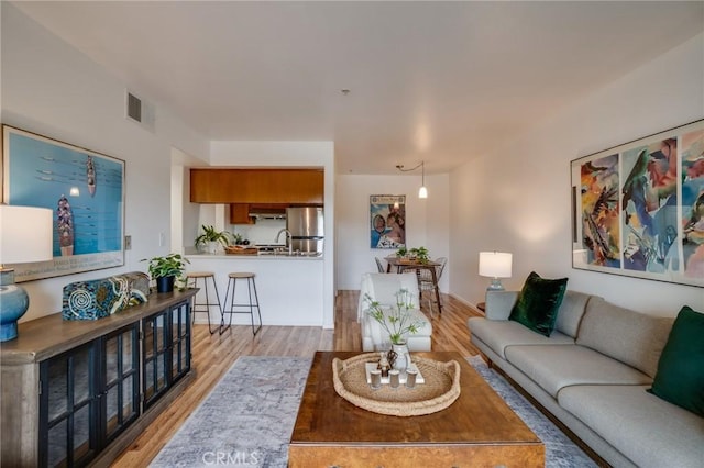 living area with wood finished floors