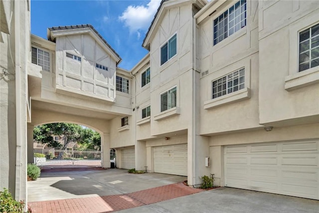 166 Alta St Unit B, Arcadia, CA 91006 - view of building exterior with a garage and driveway