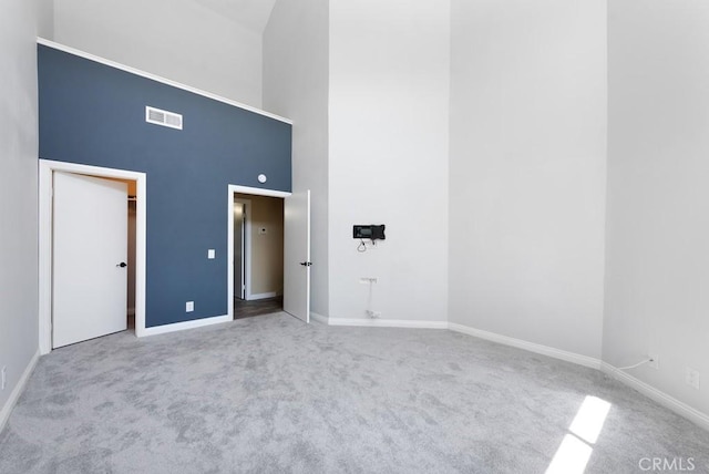 3306 Darby St Unit 402, Simi Valley, CA 93063 - unfurnished bedroom featuring a high ceiling, carpet flooring, and baseboards