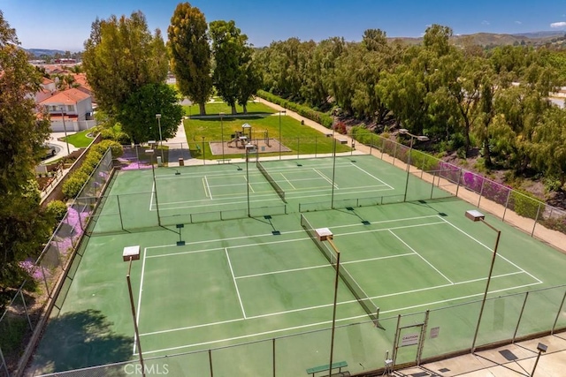 3306 Darby St Unit 402, Simi Valley, CA 93063 - view of tennis court with fence and community basketball court