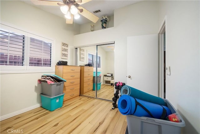 18993 Janisse Ln, Lake Elsinore, CA 92530 - bedroom featuring light wood finished floors, a closet, baseboards, and ceiling fan