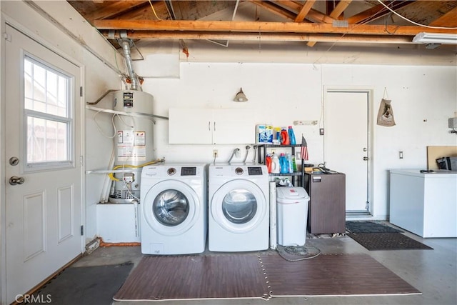 18993 Janisse Ln, Lake Elsinore, CA 92530 - clothes washing area with washing machine and clothes dryer and secured water heater