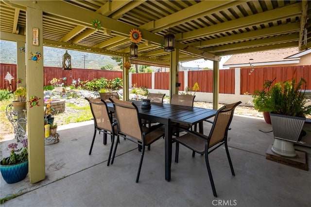 18993 Janisse Ln, Lake Elsinore, CA 92530 - view of patio with outdoor dining space and a fenced backyard