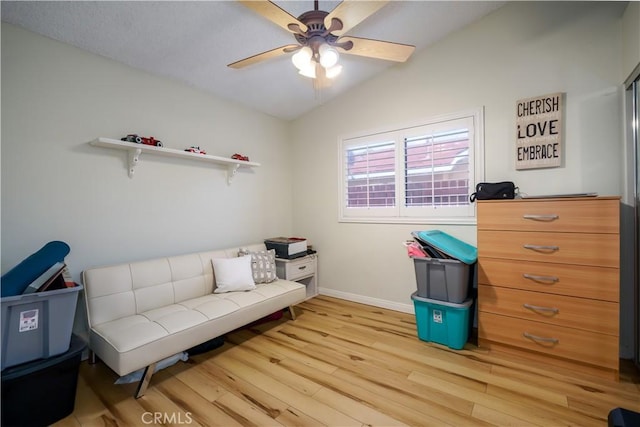 18993 Janisse Ln, Lake Elsinore, CA 92530 - living area featuring light wood finished floors, baseboards, ceiling fan, and vaulted ceiling
