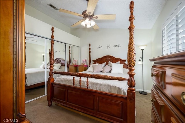 18993 Janisse Ln, Lake Elsinore, CA 92530 - carpeted bedroom with ceiling fan and a textured ceiling