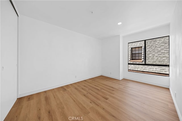 105 S Marguerita Ave Unit A, Alhambra, CA 91801 - unfurnished room featuring light wood-style floors, baseboards, and recessed lighting