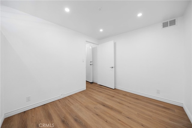 105 S Marguerita Ave Unit A, Alhambra, CA 91801 - spare room featuring wood finished floors, baseboards, and recessed lighting